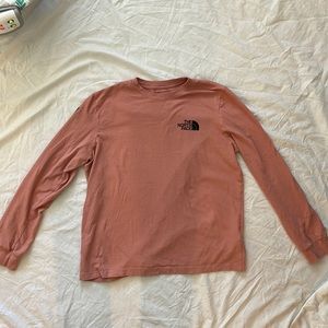 The North Face long sleeve shirt size M fits like a S.